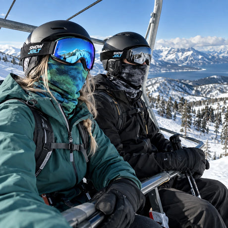 Two people on a chairlift wearing Snow Jolt balaclavas